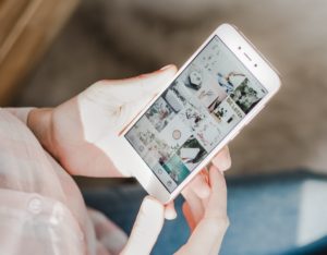 Person using hashtags to navigate social media